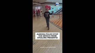 Aurora police stop the Grinch from stealing presents!