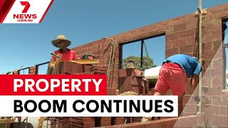 Property prices surge despite rate rise fears | 7NEWS