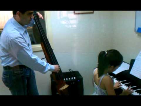 Elenita playing Lullaby in duo with Artie Smiles on the Bass (November 4 2011)