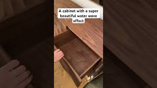 A cabinet with a super beautiful water wave effect