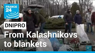 From Kalashnikovs to blankets: residents of Dnipro equip themselves against Russian invaders