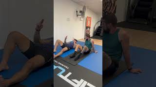 McGill curl up with explanation of belly breath and brace. #coreactivation #injuryprevention