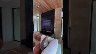 The early rough-in stages of our great room #netzero fireplace wall, to the final completion