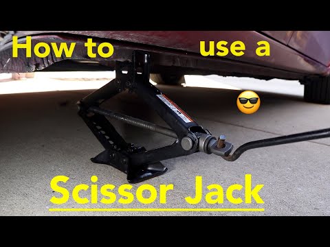 How to use a Scissor Jack that comes with your car and take a tire off and put it back on