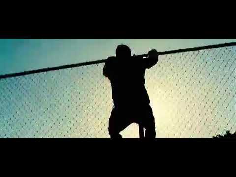 Liam Neeson Jumps Over A Fence