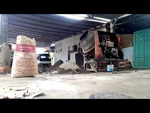 proses pencampuran pasir batako