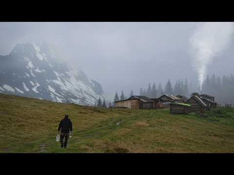 Abandoned shelter in the mountains, a night in a rustic log cabin with a stove