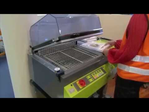 Egg tray wrapping machine