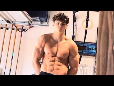 Defeated bucket hat man lifts weights