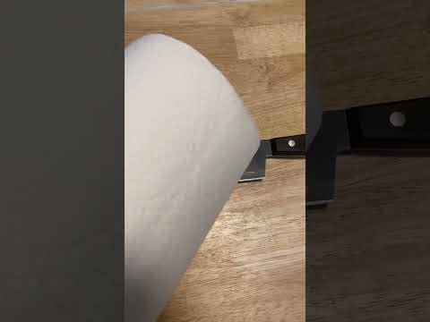 Cutting a knife with a paper towel