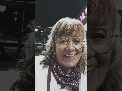 Woman Smiling Wearing Grillz And A Bandana#grillz #bandana #smilingwoman #glasses