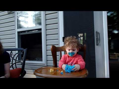 Amelias first cupcake with Grandma