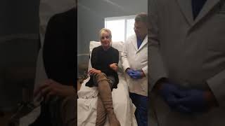 A client talks with Dr. Earl