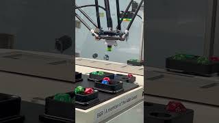 ABB Robotics Flex Picker Robot picking up dice at Automate 2023