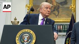 Trump says he didn't fire staffer who posted racist video of Obamas