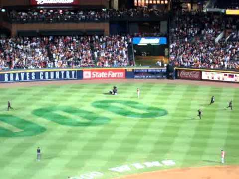 Ugly Bride is Ganged tackled at Braves game!