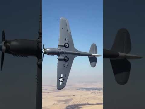 "Shark-Mouthed Legend: P-40 Warhawk Takes Flight!" #militaryaviation #jetfighter #military