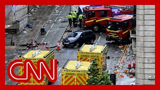 Man arrested after car hits pedestrians at Liverpool FC parade