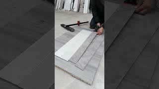 A seasoned master craftsman with 20 years of experience, cutting porcelain on-site...