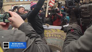 Small group of anti-Islam protesters met by large crowd of counterprotesters in downtown Minneapolis