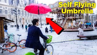 A self-flying umbrella keeps your hands free