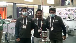 Teams stop at the trophy on their way to the floor