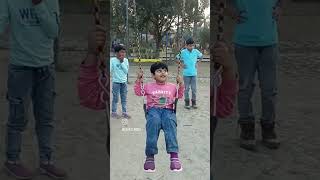 Swinging joy: carefree moments in the park#parkfun #swingtime #childhoodjoy #simplepleasures