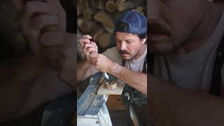 carving a spoon out of almond wood!