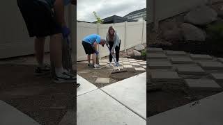 We made a grilling patio with just a few pavers, gravel and rock glue over a weekend! #diy #backyard