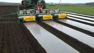 samco maize drill in germany laying degradable plastic mulch march 2009