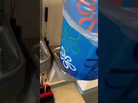 Trash can on water fountain