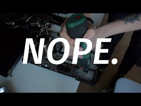 Why do people drill holes in their laptops?