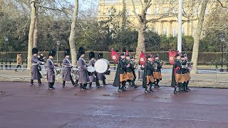 They play bagpipes changing the guard