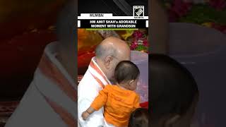 HM Amit Shah shares heartfelt moment with grandson while offering prayer at Lalbaugcha Raja