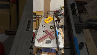 Over to the router table to add a chamfer to the ends of the walnut and purpleheart cross.