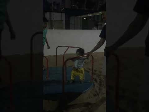 Baby first time in swing