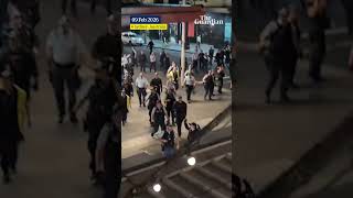Huge line of police charge protesters in Sydney