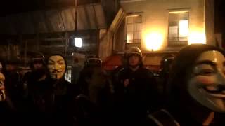 Anonymous pacifist march face to french police