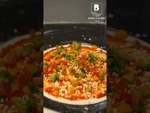 Paired with our secret sauce, loaded with fresh toppings & baked to perfection in our brickoven.