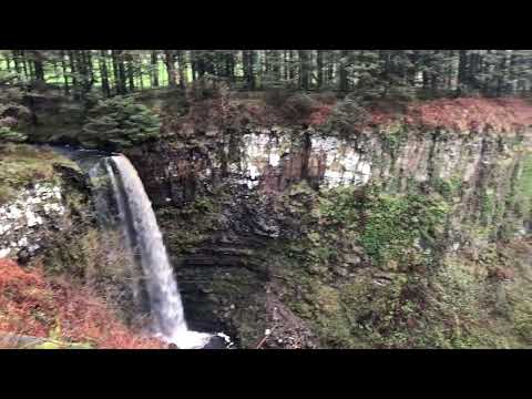 Eas Mor Waterfall and view to the south of the Isle of Arran, over Ailsa Craig and Pladda