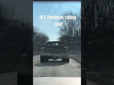 Lifted 6.7 Cummins rolling coal