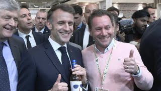 Macron receives a bottle of wine with 'For Sure' label inspired by his viral Davos appearance | AFP