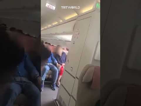 A passenger sitting near the emergency exit on an Asiana Airlines plane opened the door mid-flight.