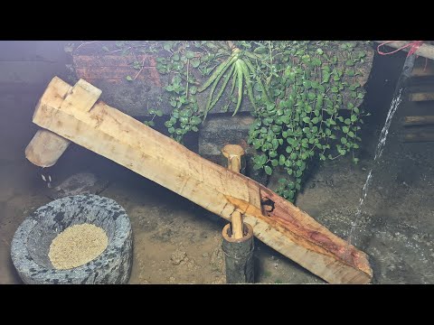 ancient water-powered rice pounding mortar