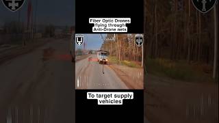 Fiber Optic Drone evades nets to target a supply vehicle.