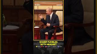 Pakistan PM Shehbaz Sharif fumbles with headset; Putin laughs | WATCH
