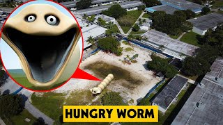 DRONE CATCHES HUNGRY WORM FROM ROBLOX EMERGING FROM THE EARTH & EATING PEOPLE IN REAL LIFE!