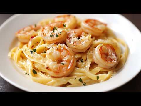 This recipe will drive you crazy! Incredibly tender pasta with shrimp in a thick creamy sauce!