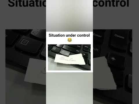 “Under Control: Situation Handled! 💻” TechManagement #LaptopLife #SituationHandled #ControlButton