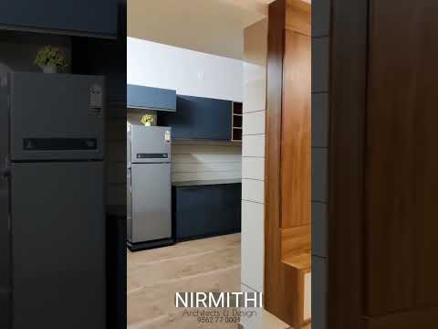 Awesome interior work | Living area & Kitchen | Nirmithi Interiors